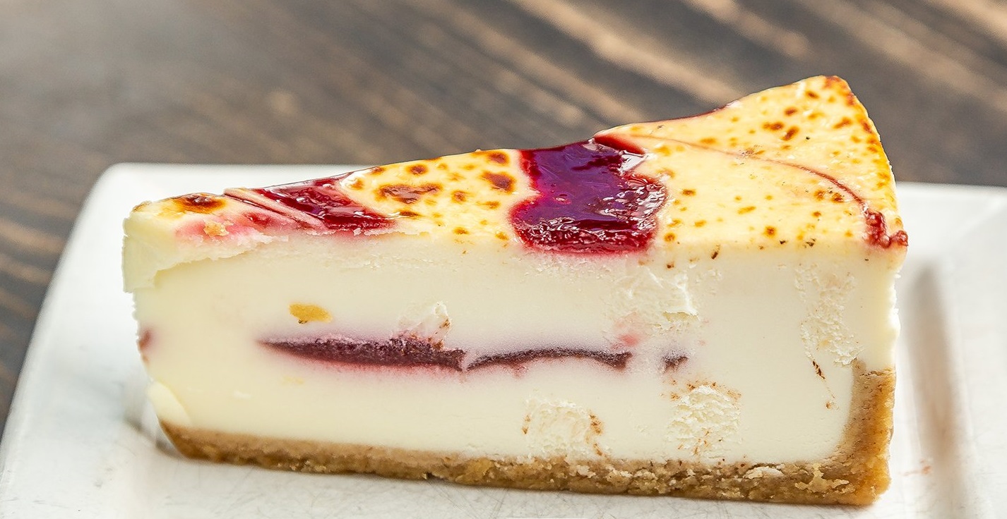 Order Raspberry White Chocolate Cheesecake Brulee food online from MidiCi store, Orem on bringmethat.com