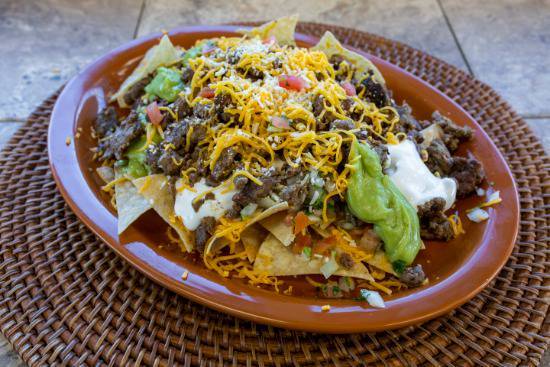 Order Tortilla Chips with Beef food online from Roberto Taco Shop store, Henderson on bringmethat.com