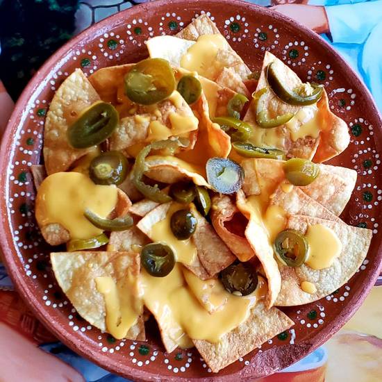Order Nachos food online from Matachines Authentic Mexican Food store, Edmond on bringmethat.com