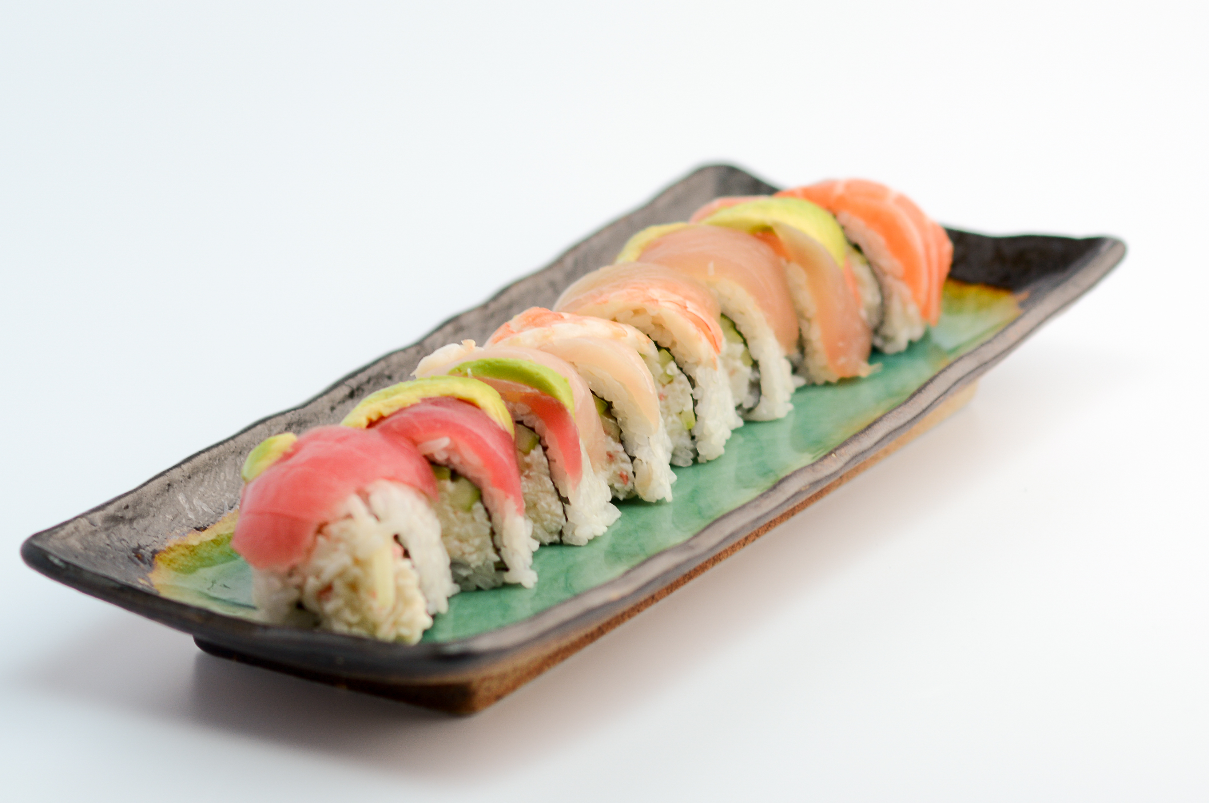 Order Rainbow Roll food online from Go Go Sushi store, Pasadena on bringmethat.com