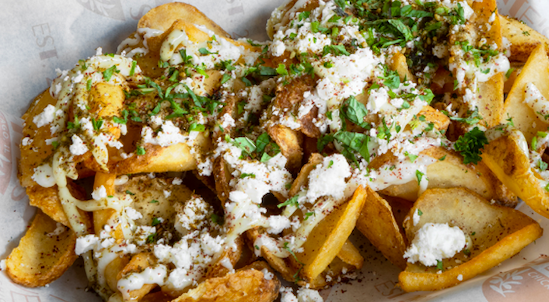 Order Super Garlic and Feta Fries food online from Evette's Chicago store, Chicago on bringmethat.com