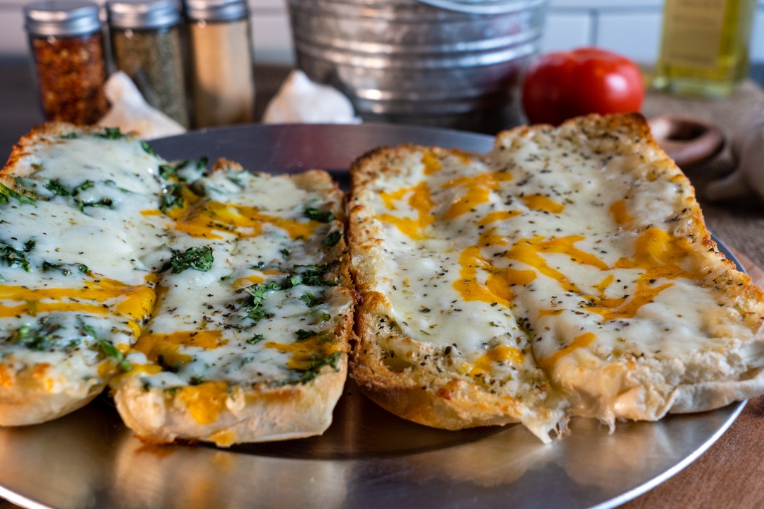 Order Cheesey Garlic Bread food online from Falbo Bros Pizzeria store, Iowa City on bringmethat.com