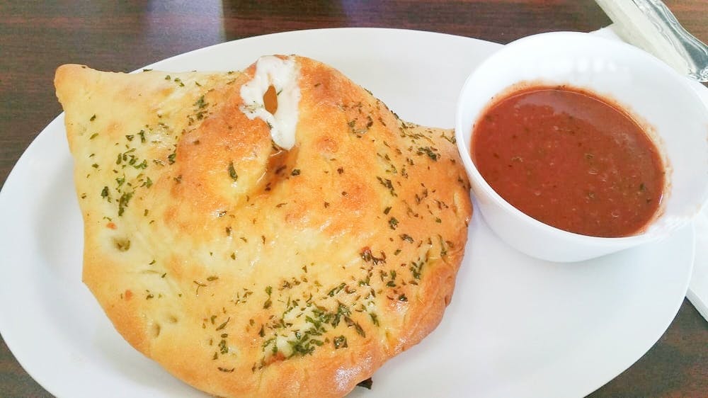 Order Classic Calzone - Regular 10'' food online from Star Pizza & Pasta store, Roswell on bringmethat.com