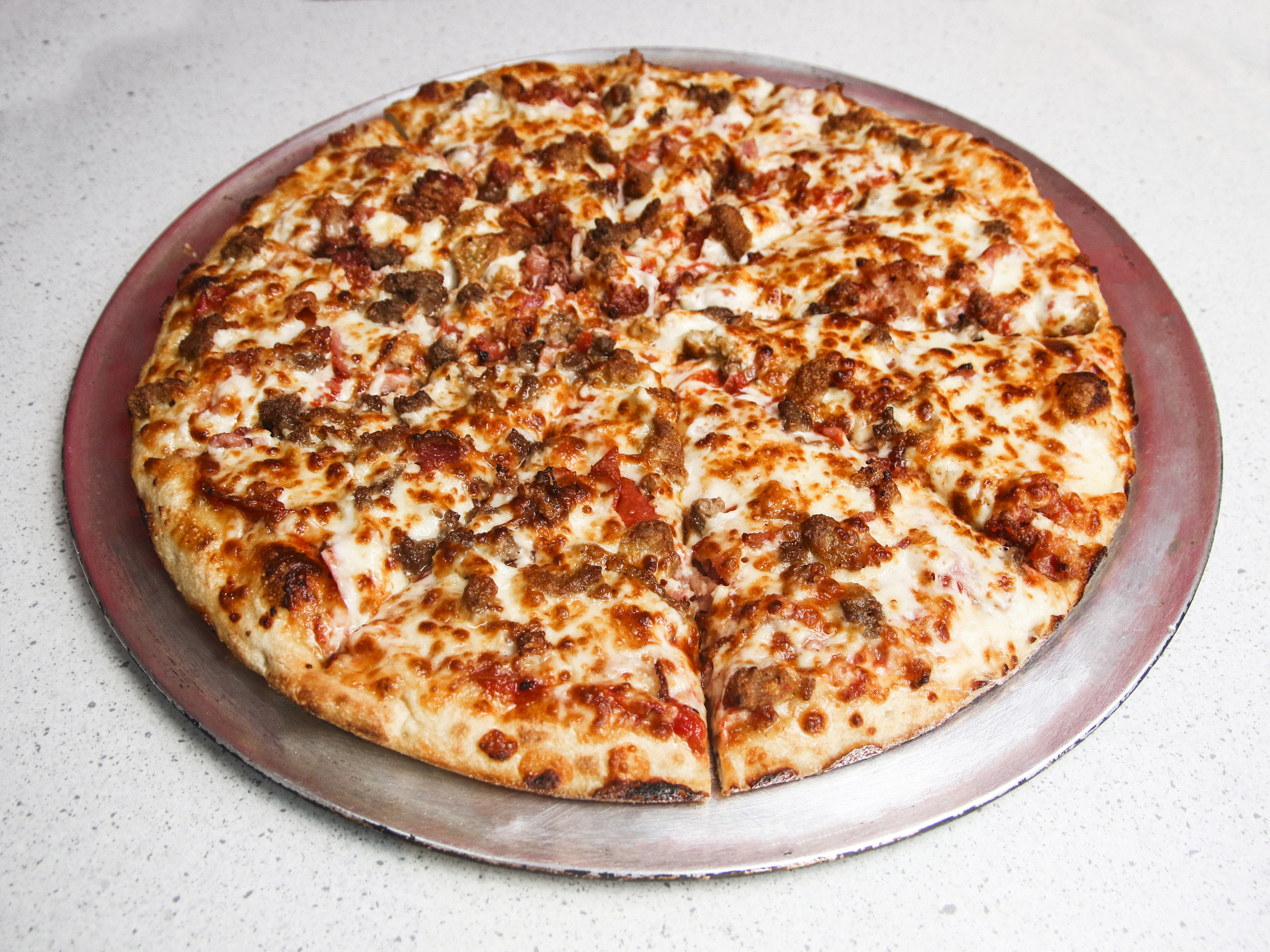Order Meat Lovers Pizza food online from Papa's Pizza & BBQ store, Clinton Twp on bringmethat.com
