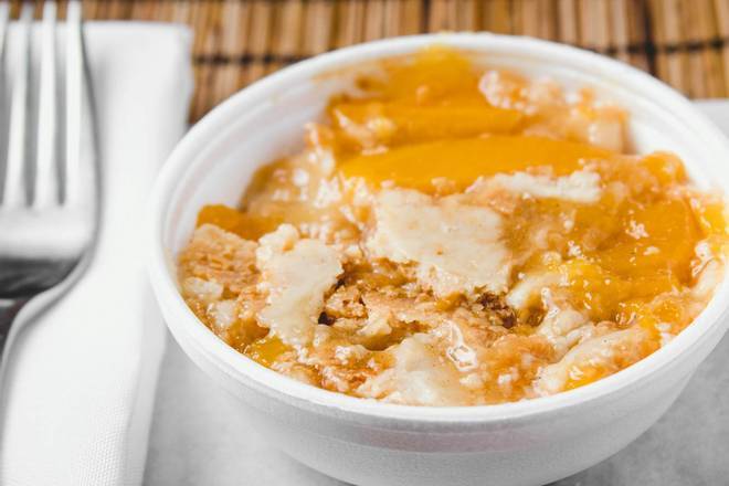 Order Peach Cobbler food online from Frenchy's Chicken store, Humble on bringmethat.com