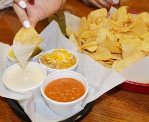 Order Chips, Queso, Beans, & Salsa food online from Tacobar store, College Station on bringmethat.com