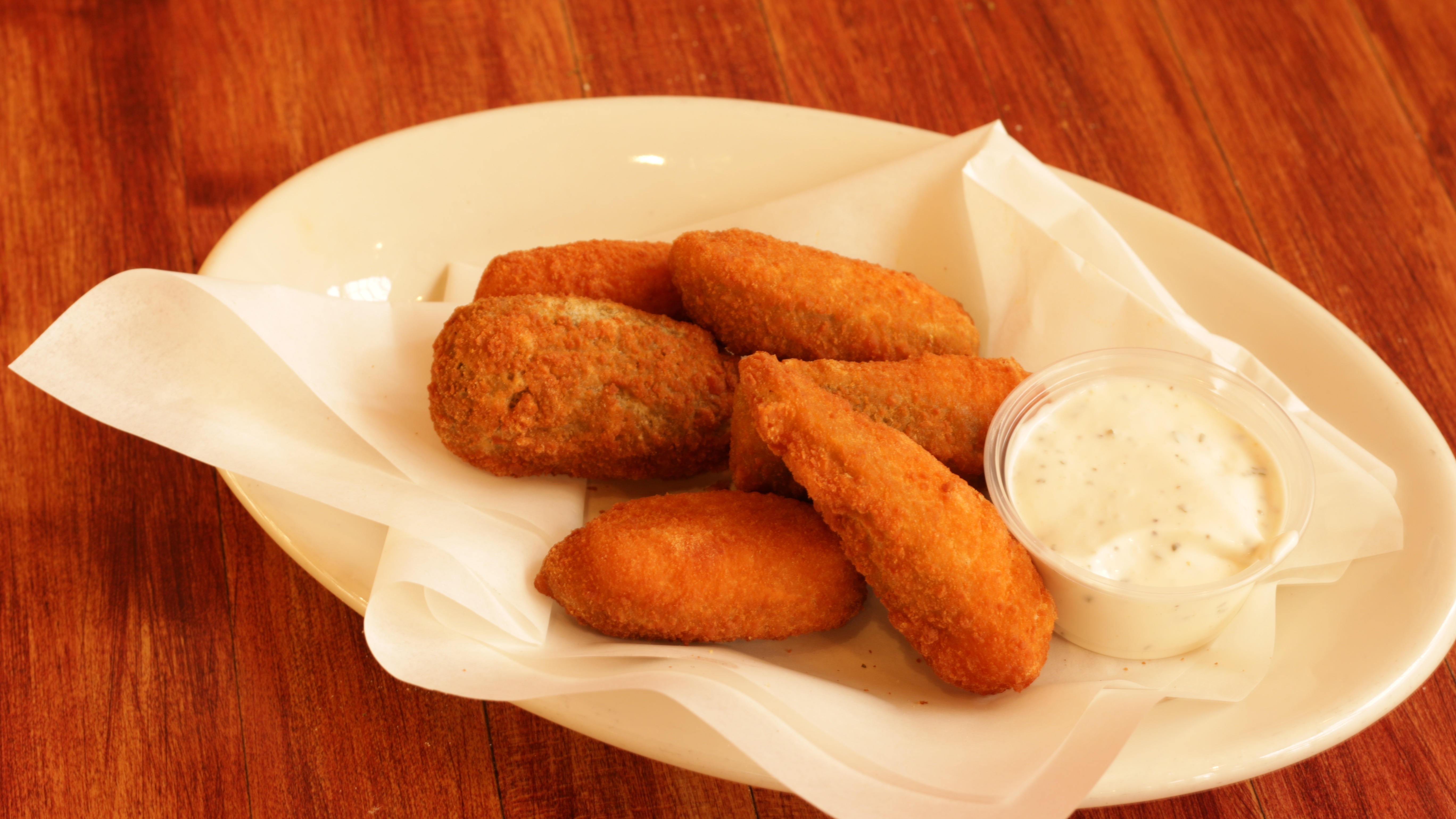 Order 6 Pieces Jalapeno Poppers food online from Antonious Pizza Cafe store, Riverside on bringmethat.com