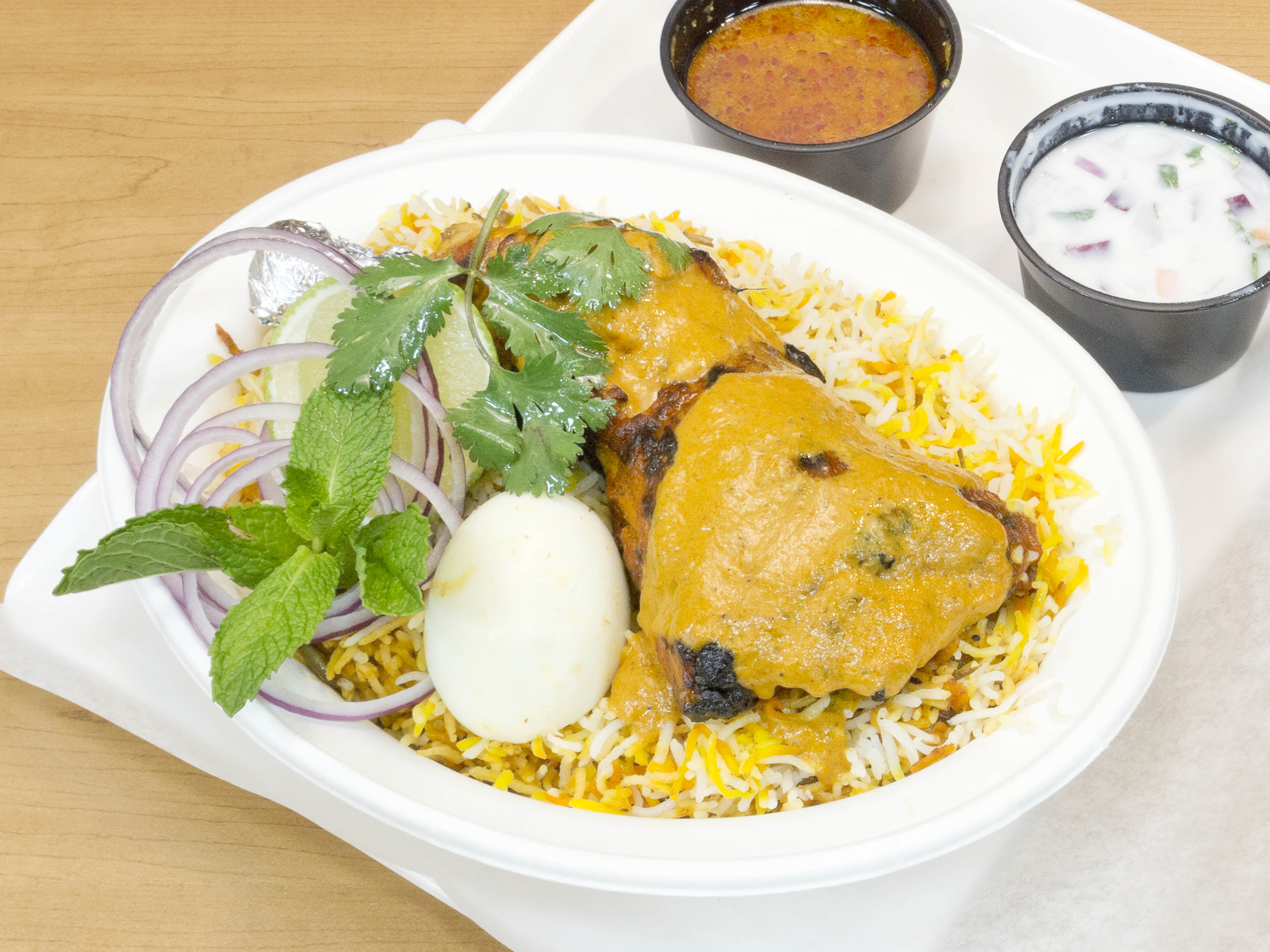 Order Joint Chicken Biryani food online from Hot Breads store, Plano on bringmethat.com