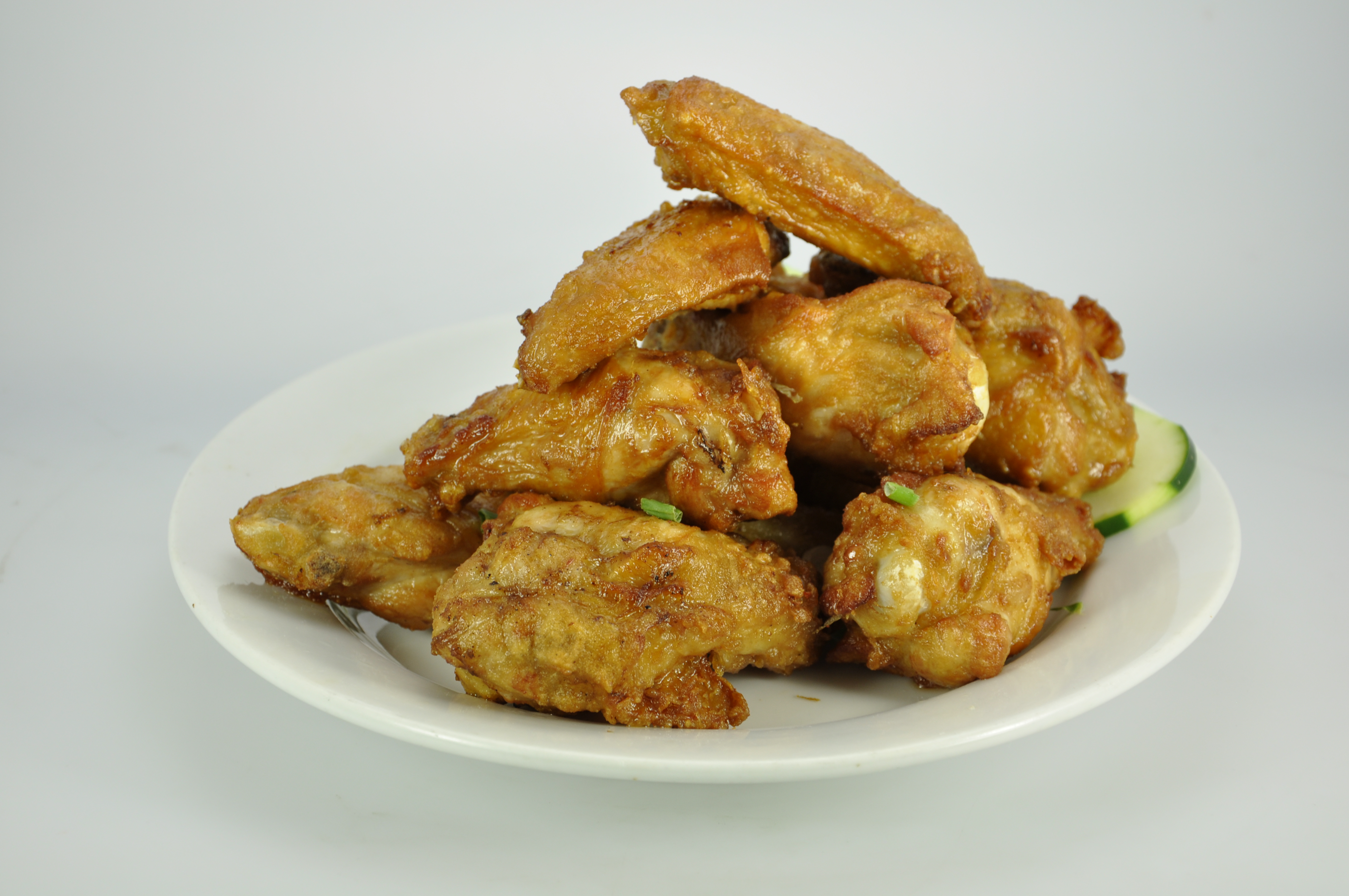 Order Chicken Wings food online from Kaieteur Express Restaurant store, South Richmond Hill on bringmethat.com