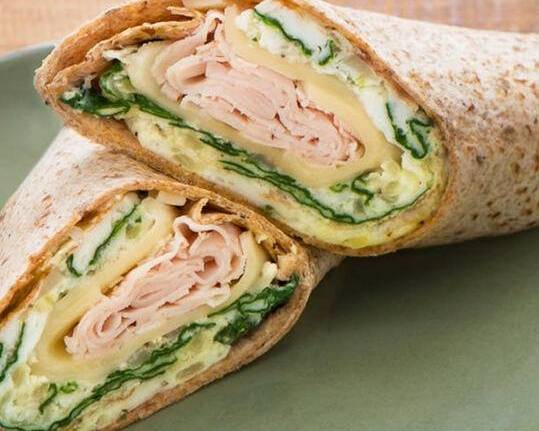 Order # 2 Wrap / 4 Egg Whites, Sliced Turkey and Alpine Swiss food online from Bagelicious Cafe store, Port Jefferson on bringmethat.com