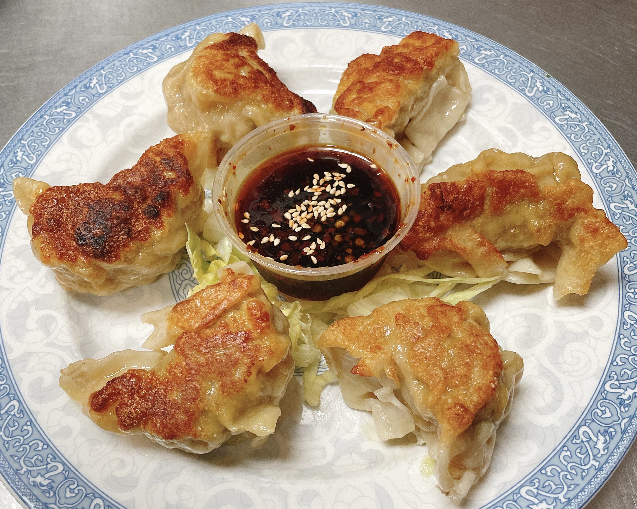Order A7. Potstickers  food online from China Cottage store, Katy on bringmethat.com