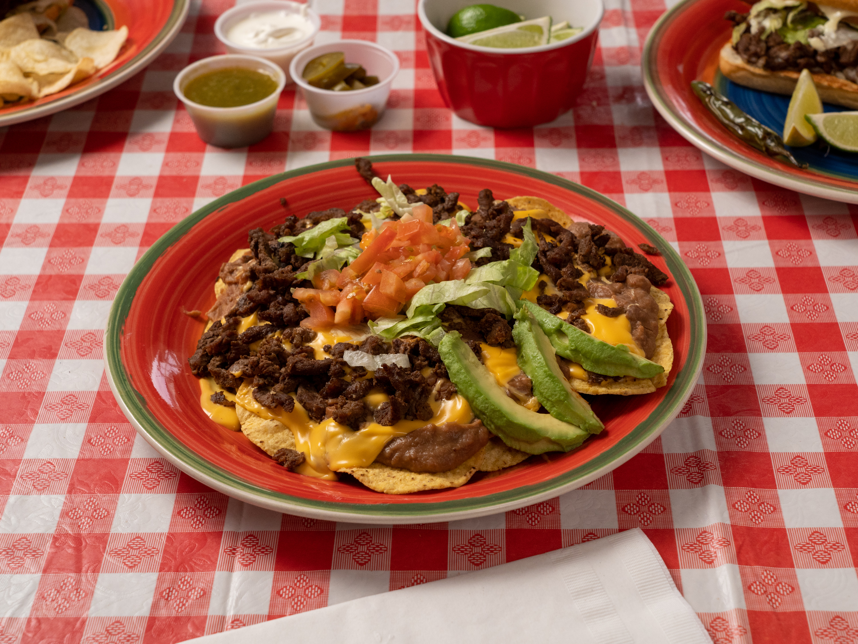Order Nachos Deluxe food online from Gordos mini tacos store, San Antonio on bringmethat.com