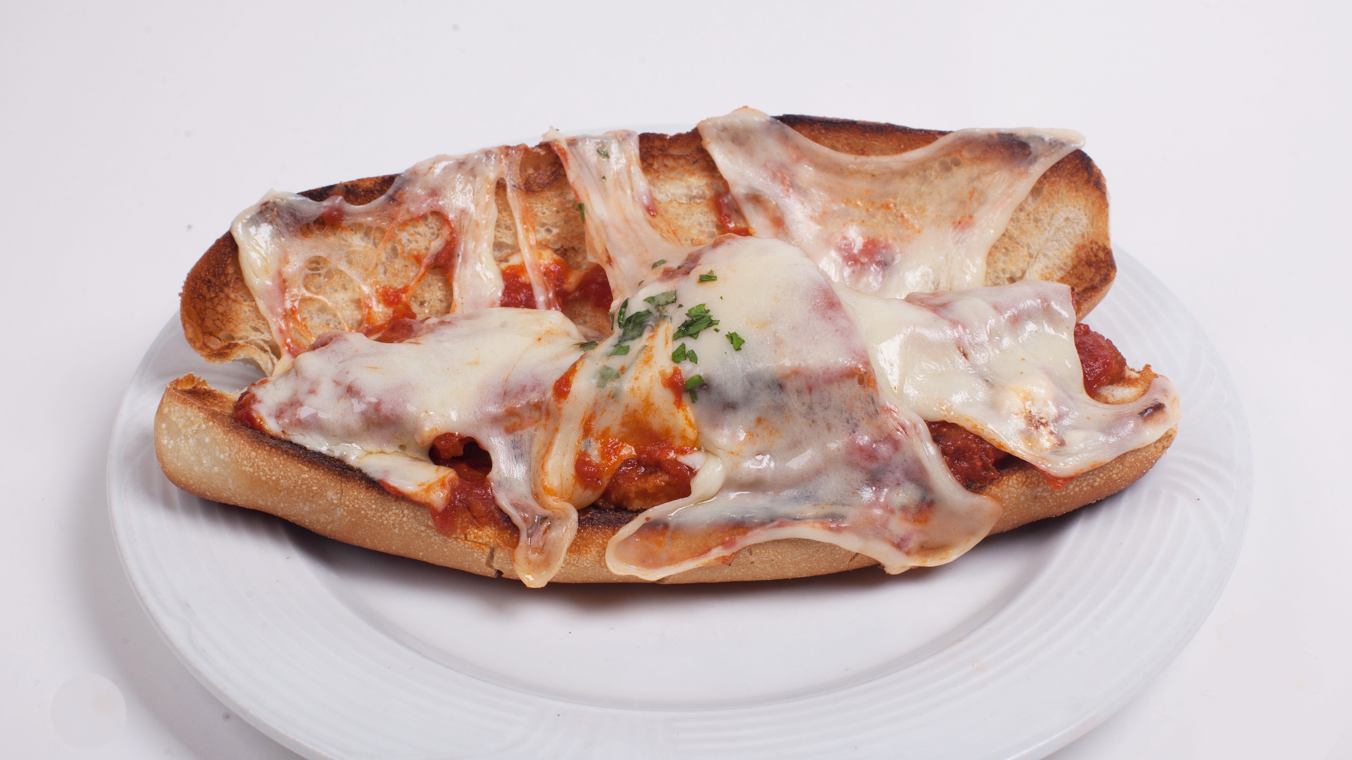 Order Chicken Parmigiana Hero food online from Umberto's Pizzeria store, New Hyde Park on bringmethat.com