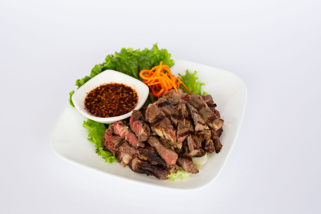 Order BBQ Beef food online from Thai Nakorn Restaurant store, Stanton on bringmethat.com