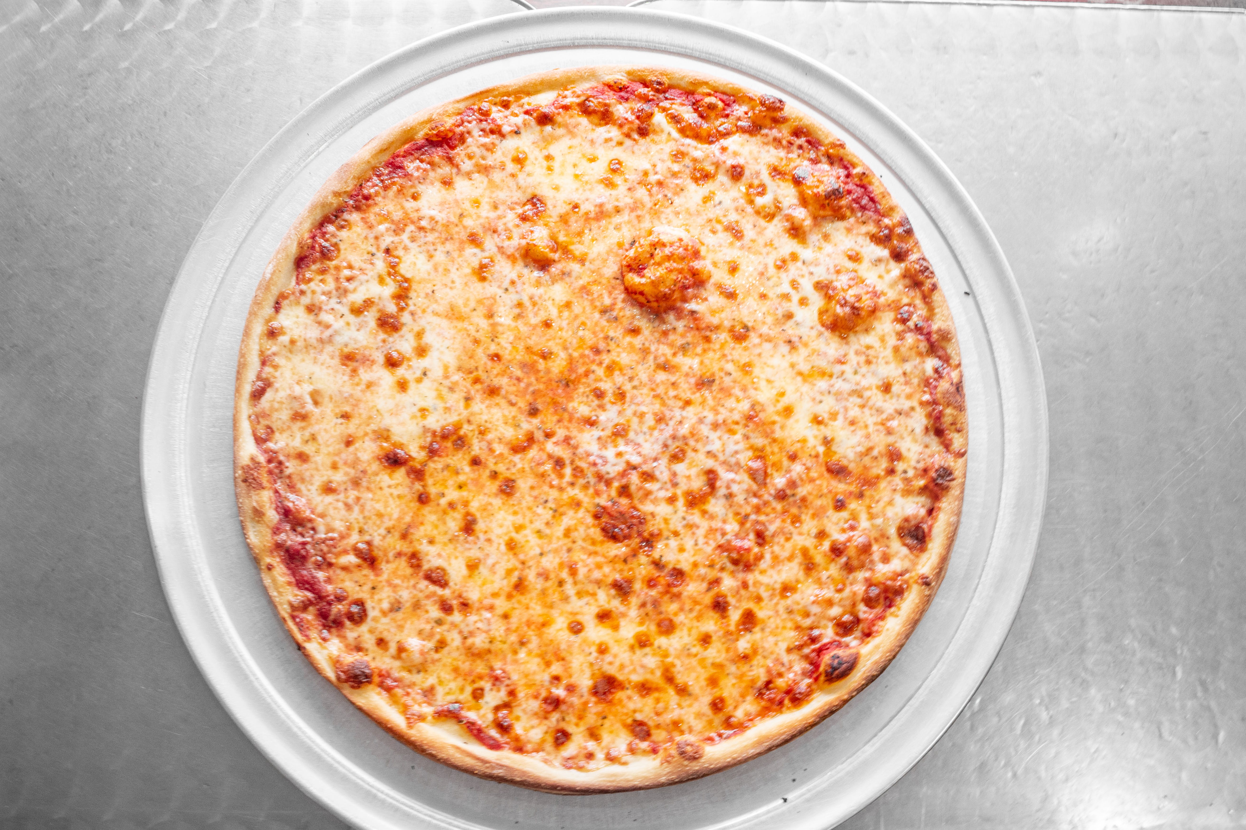Order Regular Pizza Slice - Slice food online from Not Ray Pizza store, Brooklyn on bringmethat.com