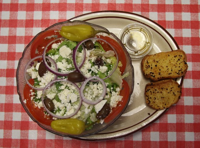 Order Greek Salad food online from Giovanni's Pizza Place store, Charleston on bringmethat.com