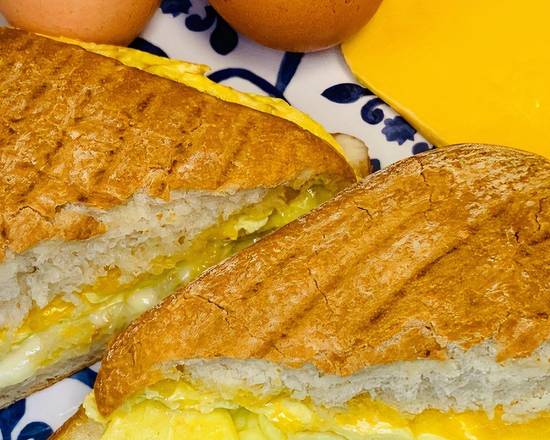 Order Sunrise Panini - Egg & Cheese food online from Java Dive Organic Cafe store, Bee Cave on bringmethat.com