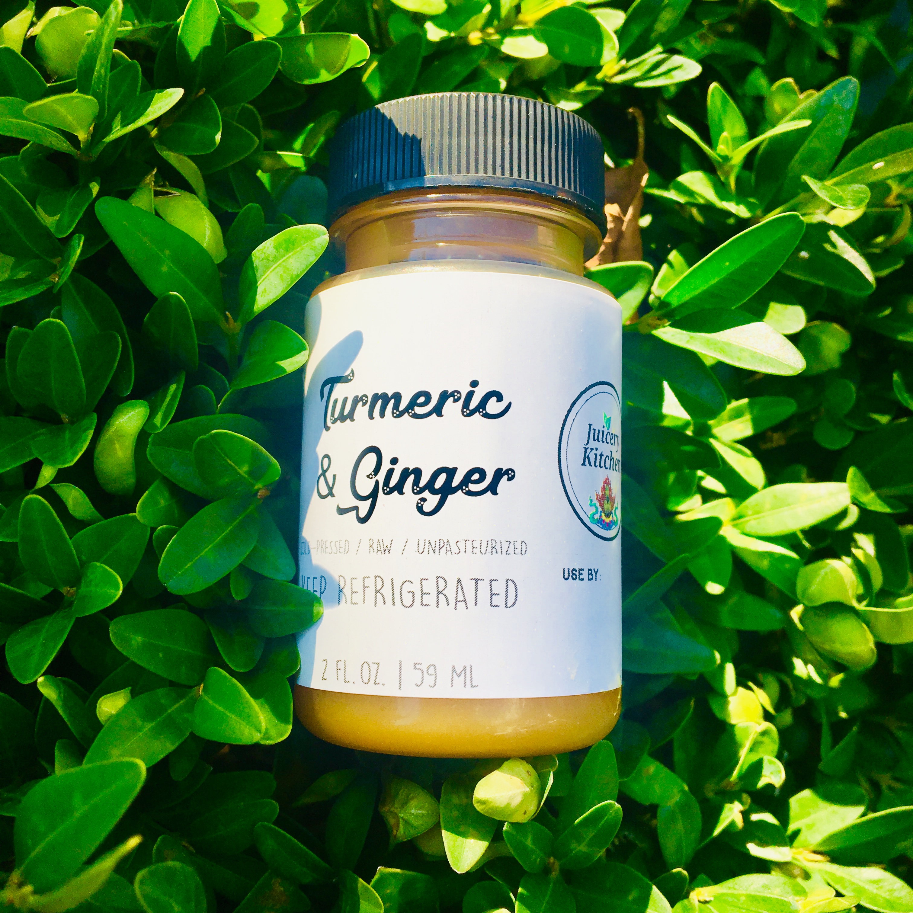 Order Turmeric & Ginger Shot food online from Juicery Kitchen store, Brooklyn on bringmethat.com