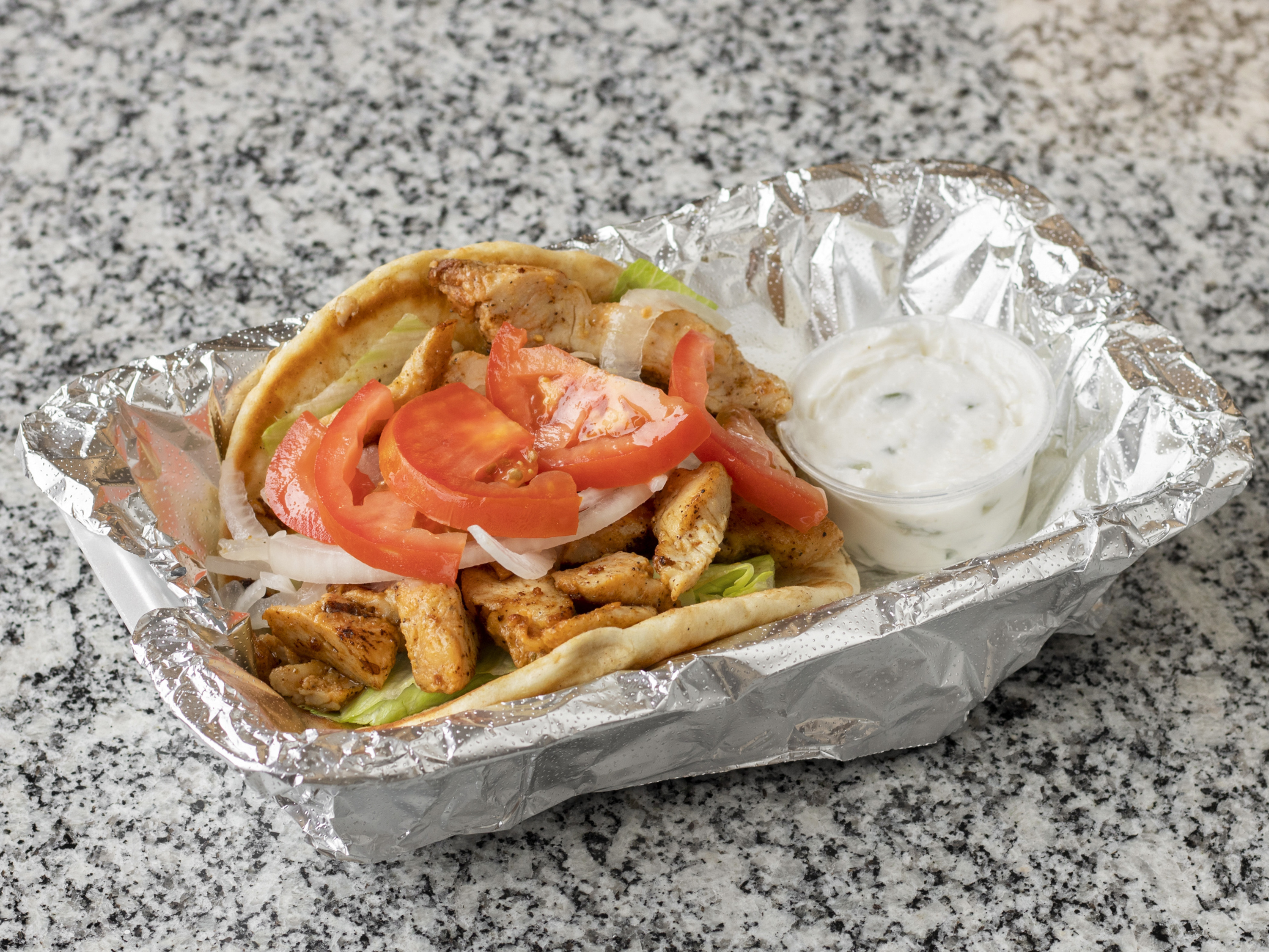 Order Chicken Gyro food online from Four Sons Takeout store, Cleveland on bringmethat.com