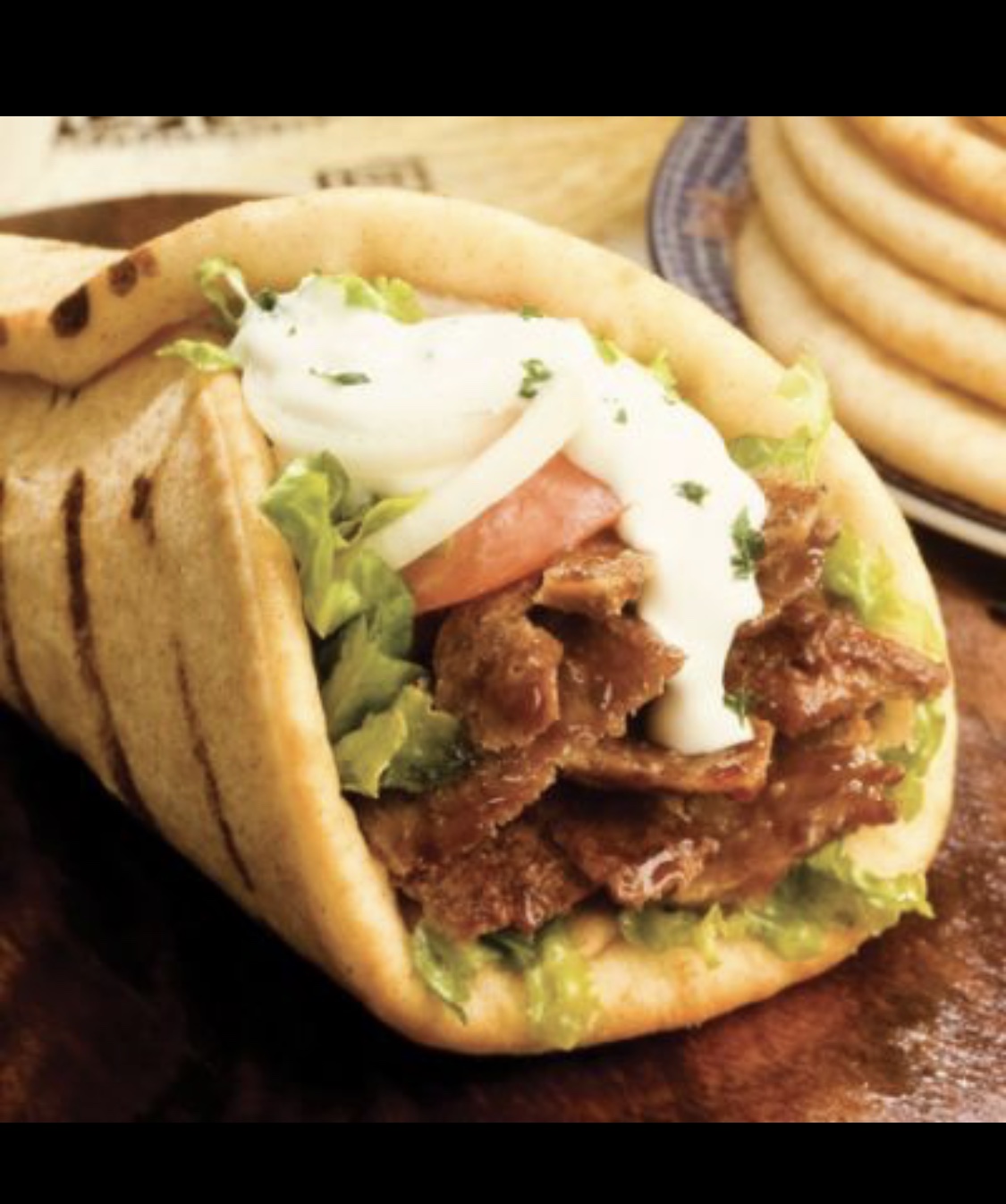 Order Gyro food online from Pizza Boli's store, Alexandria on bringmethat.com