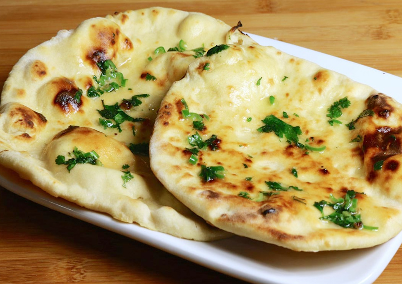 Order Cheese Naan food online from Bollywood Curry store, Los Angeles on bringmethat.com
