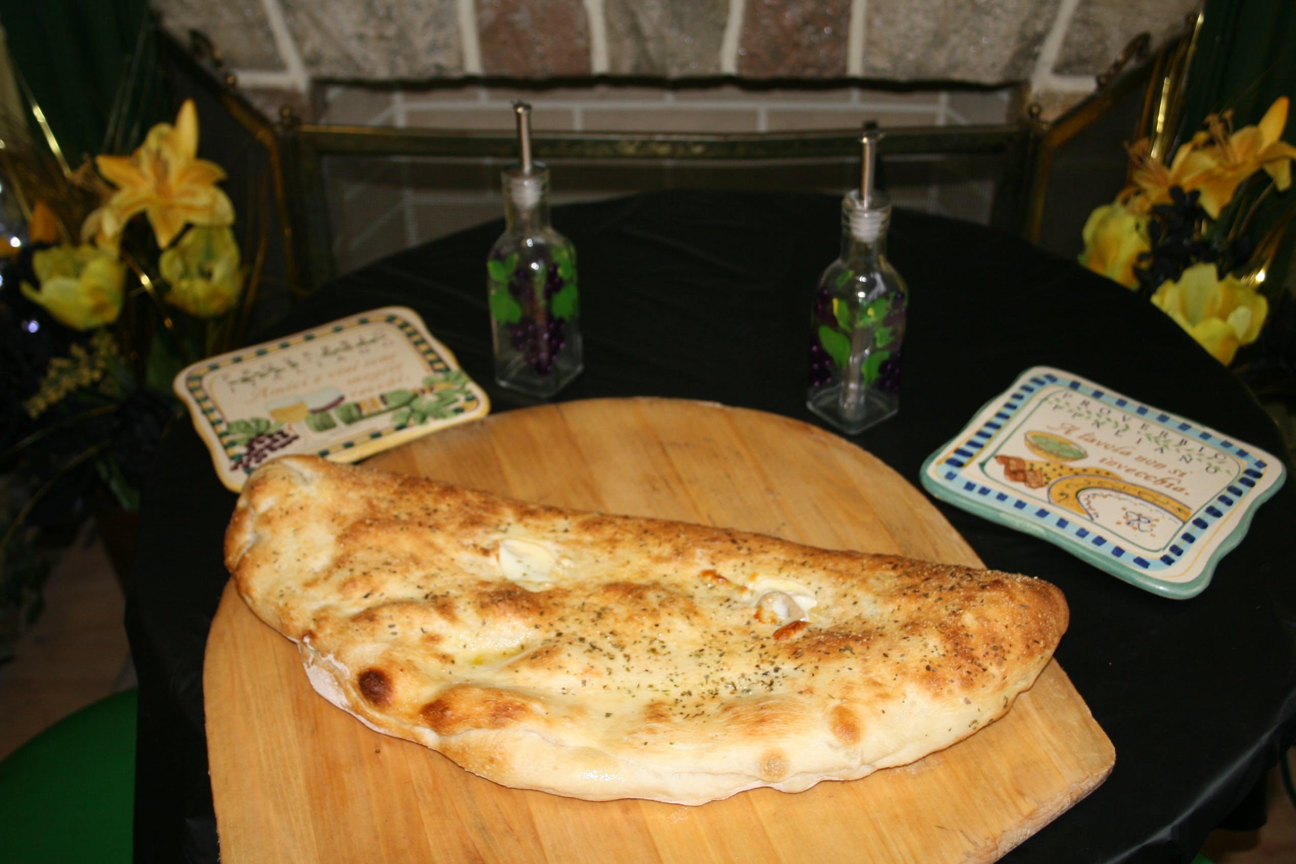 Order Calzone - Large food online from The Dough Boy's Pizzeria store, Baldwinsville on bringmethat.com