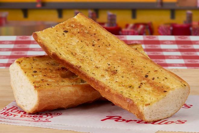 Order Garlic Bread food online from Portillo's Hot Dogs store, Niles on bringmethat.com