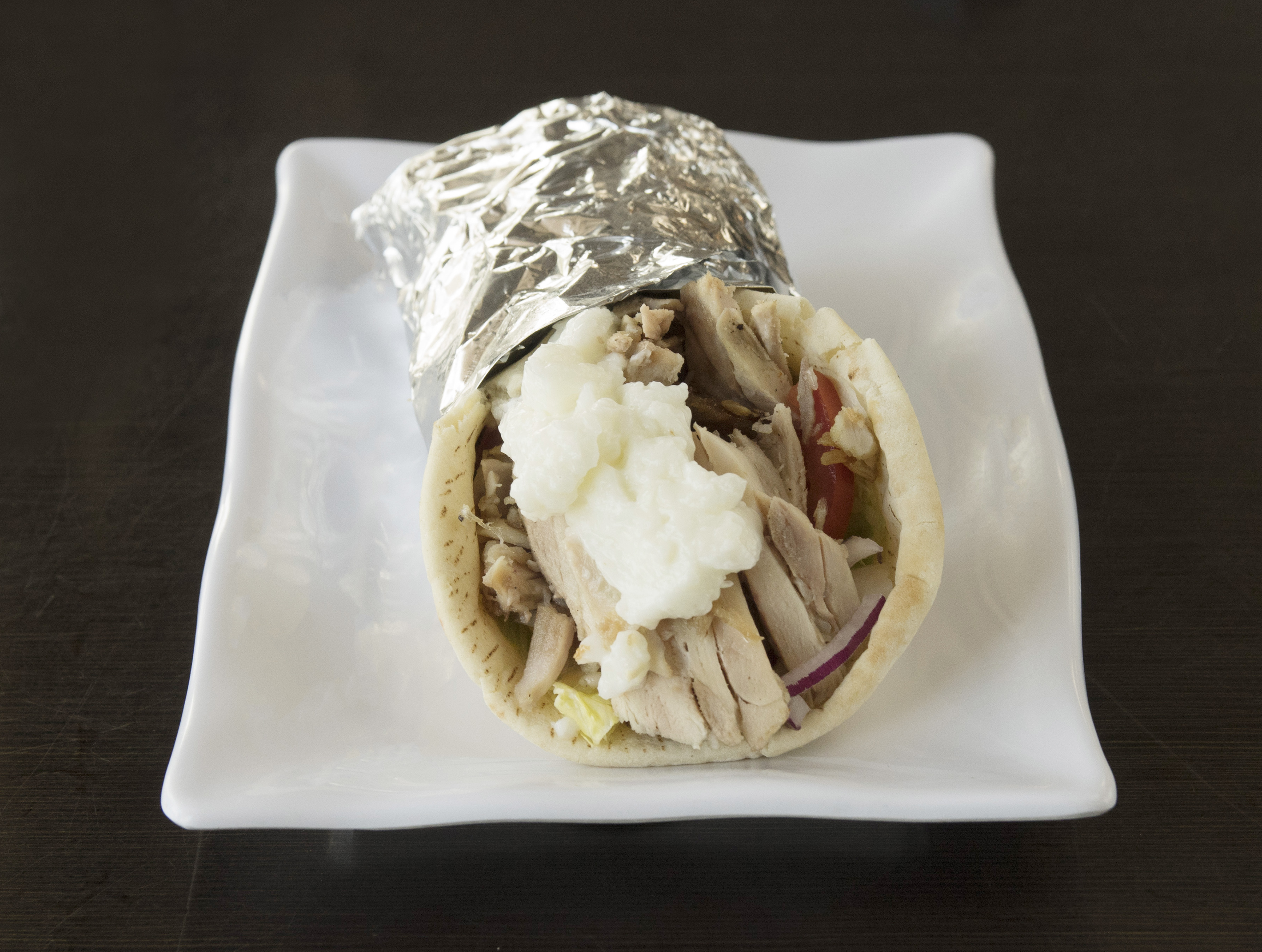 Order Chicken Shawarma Sandwich In Pita food online from North Park Produce Bakery & Grill store, Poway on bringmethat.com