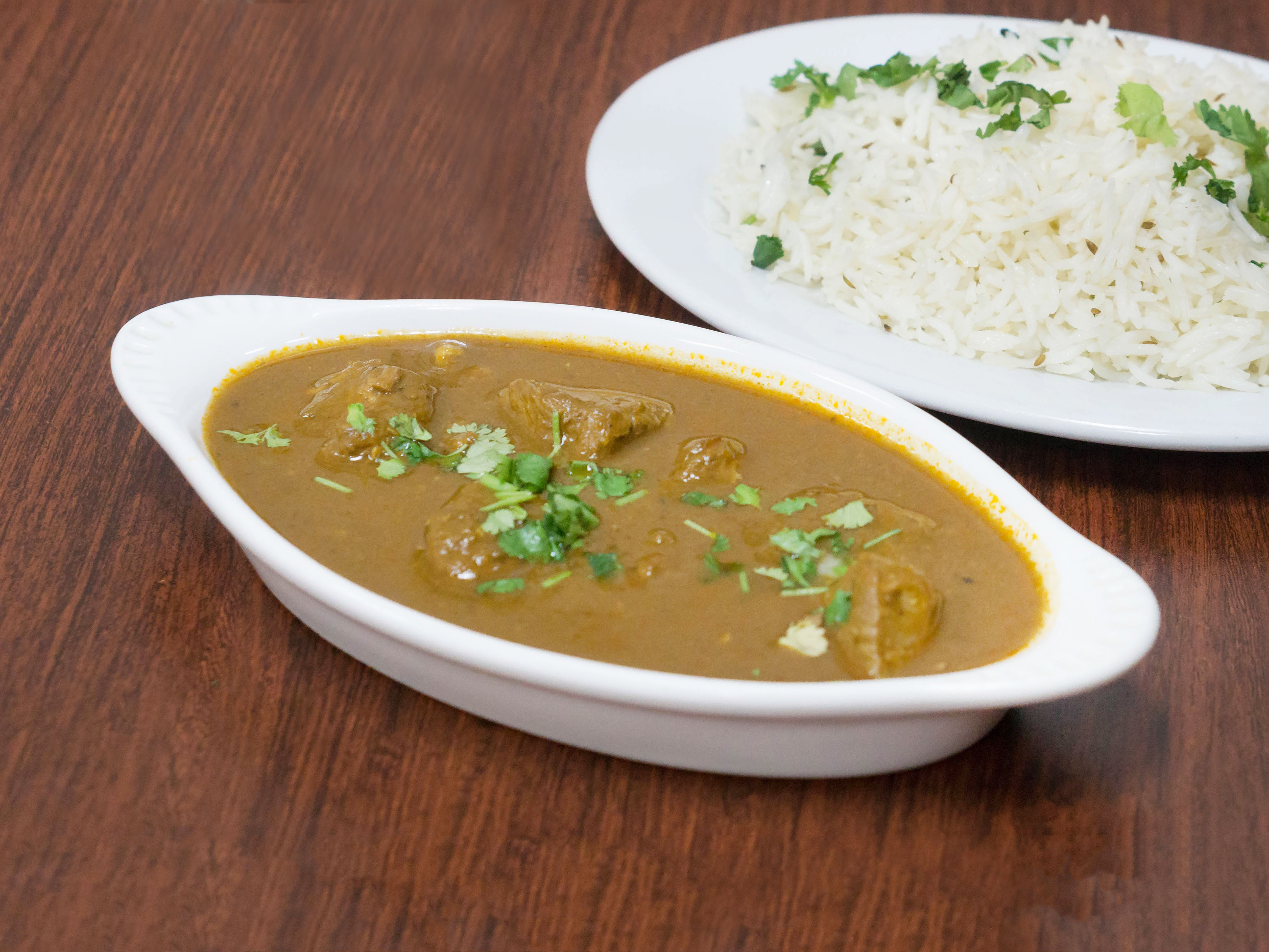 Order 9. Lamb Curry food online from Standard Sweets & Spices store, Fresno on bringmethat.com