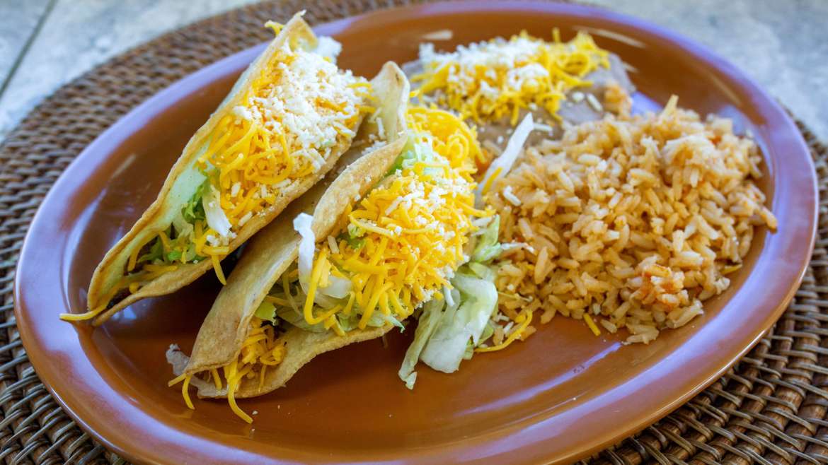 Order Two Tacos, Arroz y Frijoles food online from Taqueria Los Paisanos store, Saint Paul on bringmethat.com