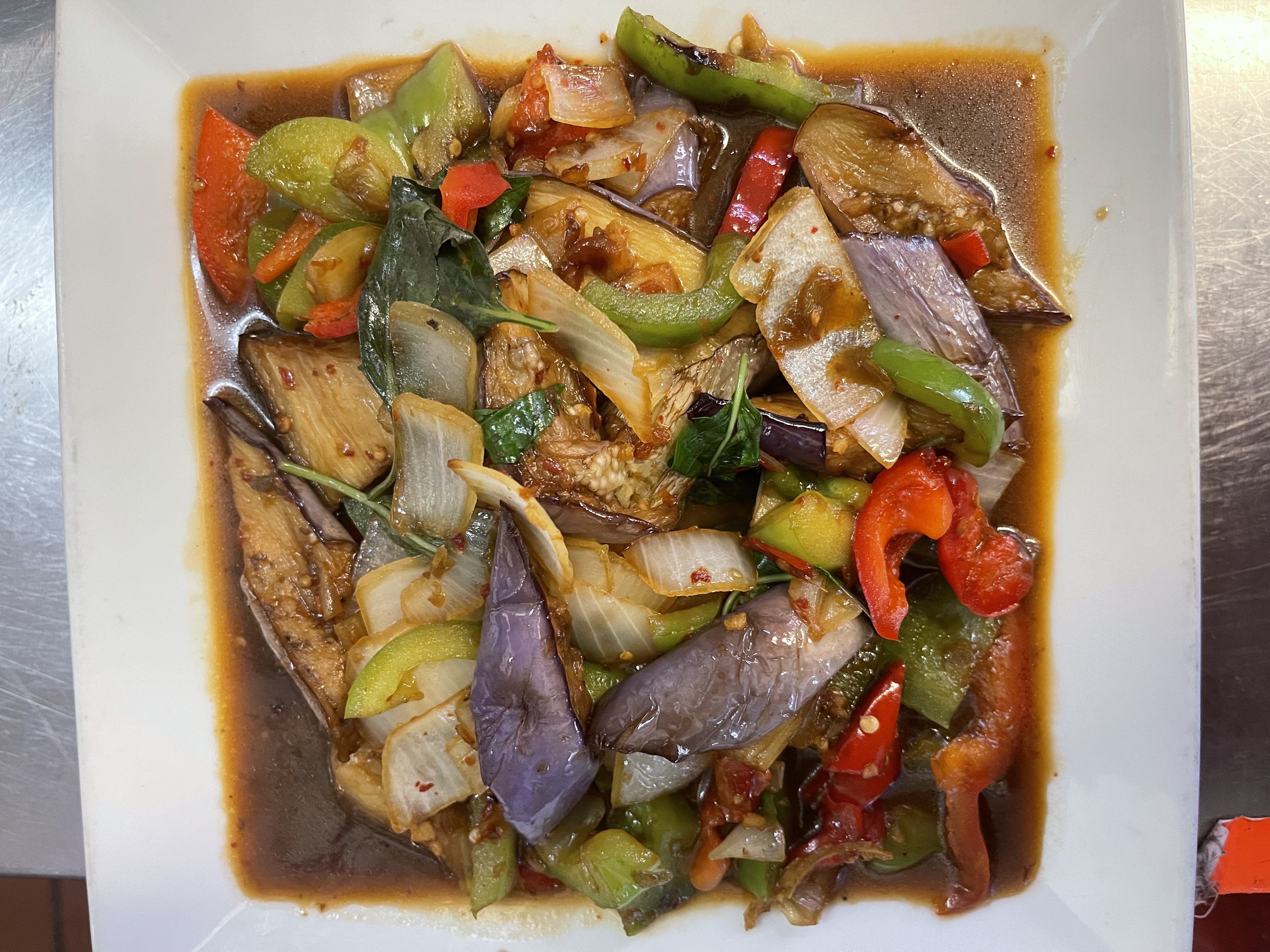 Order 35. Spicy Eggplant food online from Chada Thai Cuisine store, Sacramento on bringmethat.com
