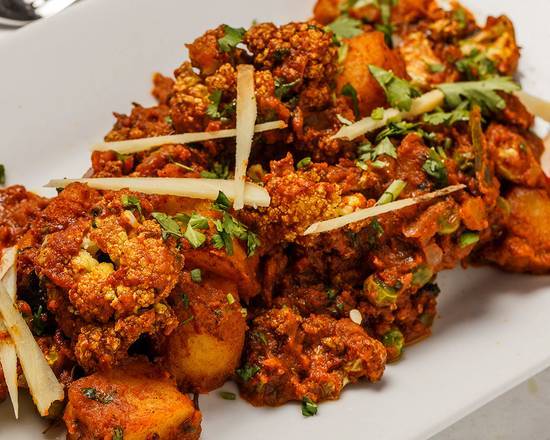 Order Alu Gobi food online from Nirvana Indian Cuisine store, New Orleans on bringmethat.com