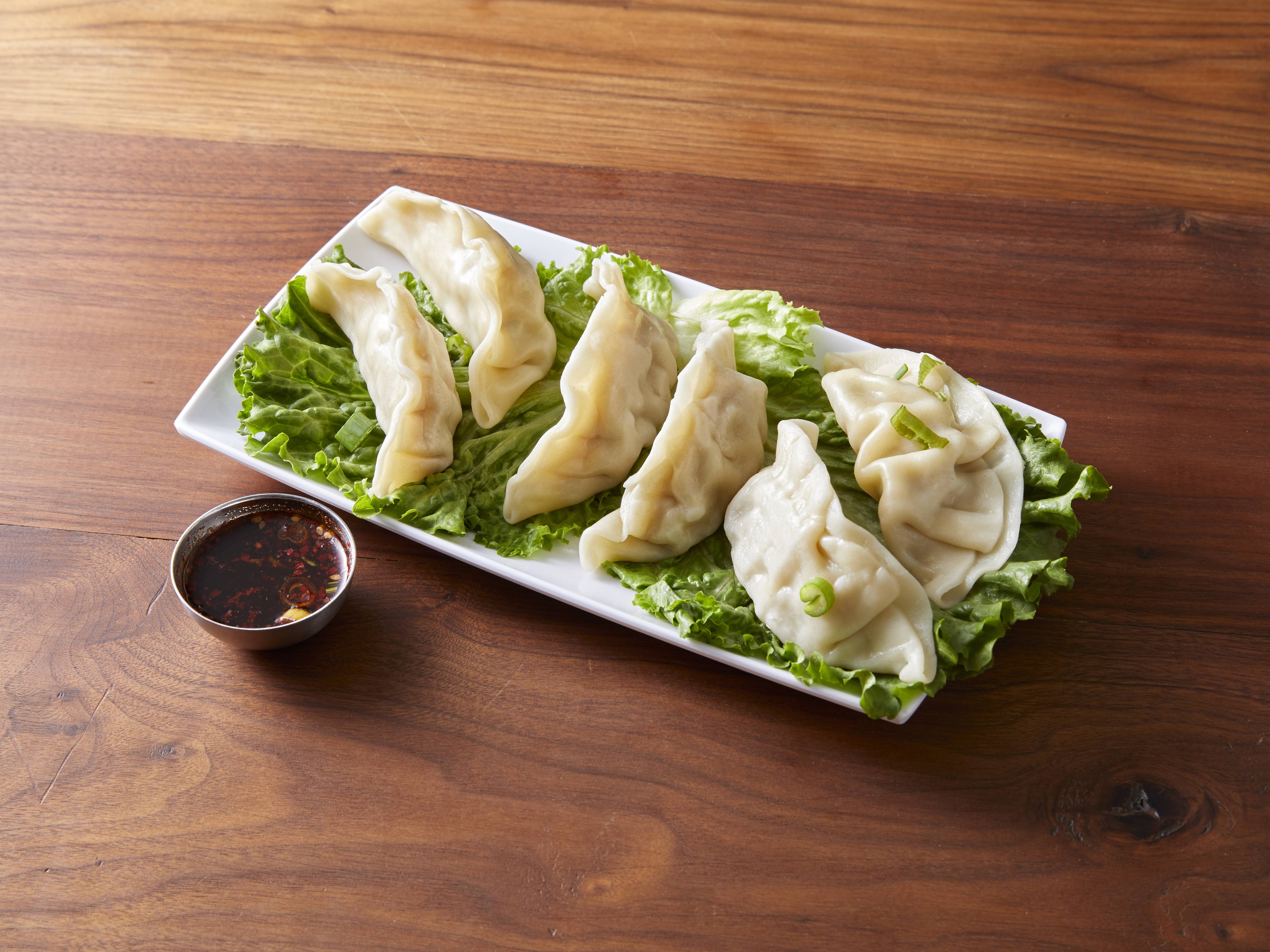 Order A 4. Steamed Dumplings food online from Lucky 7 Chinese store, Ypsilanti on bringmethat.com
