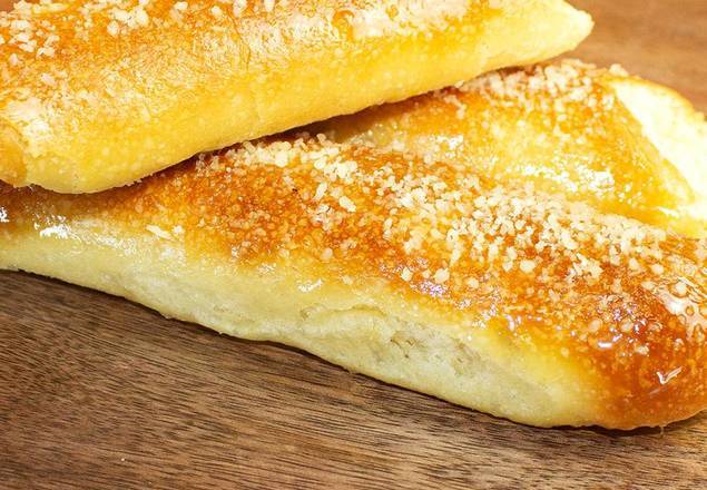 Order Breadstick (1 pc) food online from Wings Empire store, La Mesa on bringmethat.com