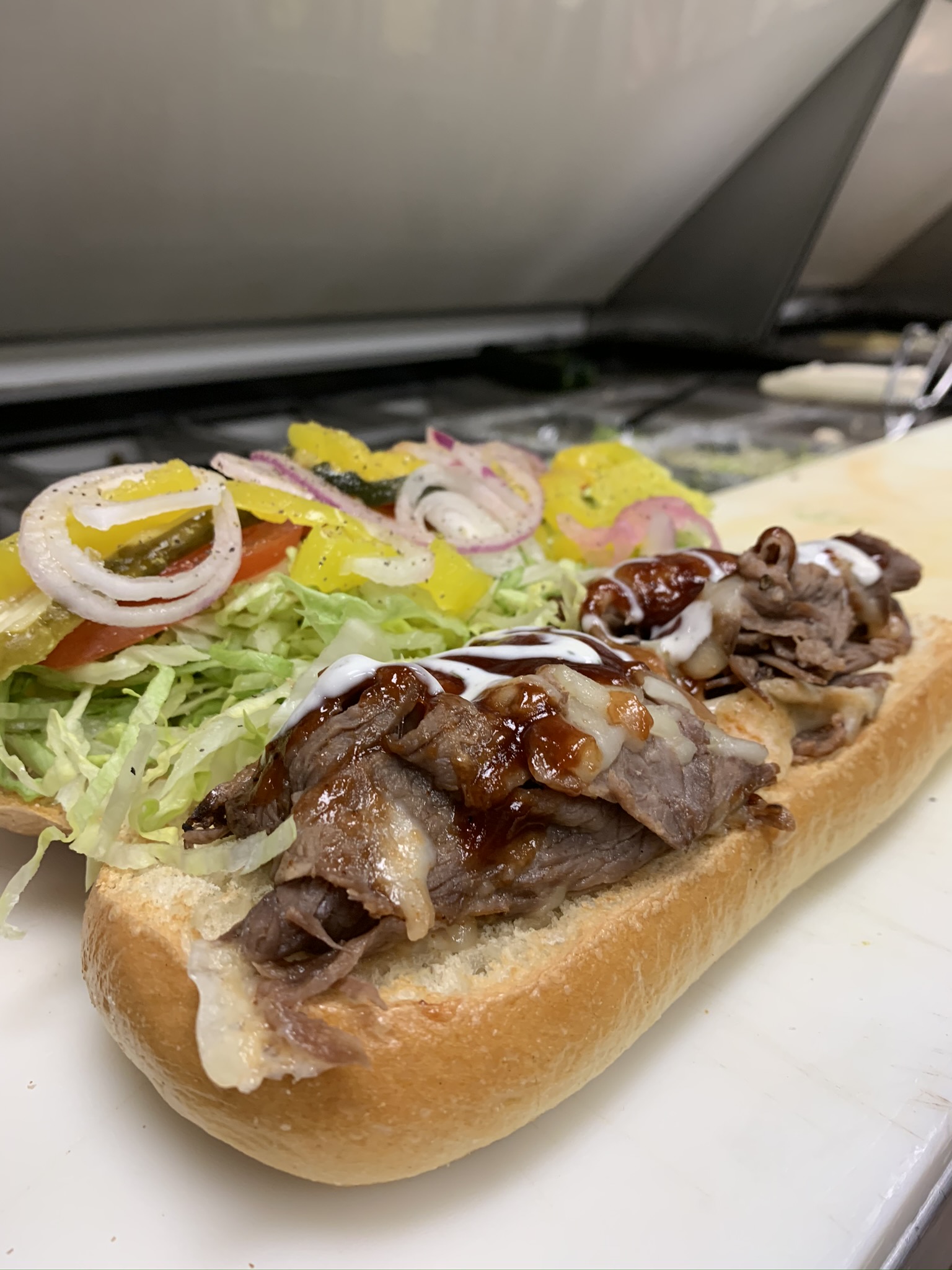 Order 12. Grilled Tri Tip Sandwich food online from The Pickled Deli store, Visalia on bringmethat.com