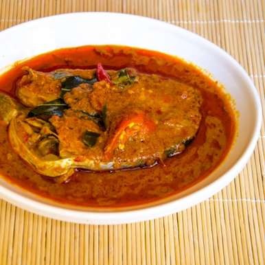 Order Fish Curry food online from Swad Indian and Nepalese Cousine store, Fort Worth on bringmethat.com