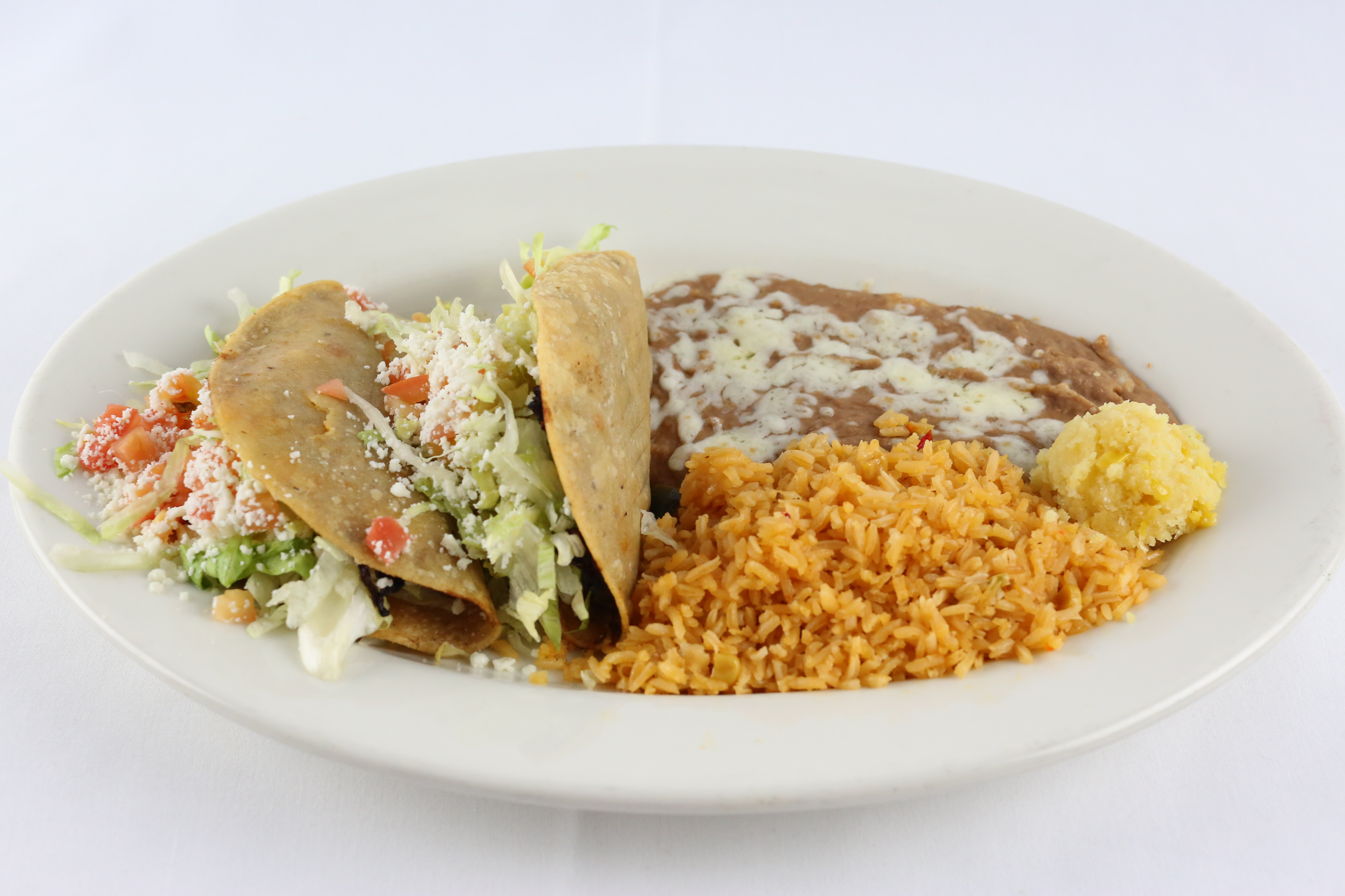 Order Two Tacos Almuerzo food online from El Tapatio store, Citrus Heights on bringmethat.com