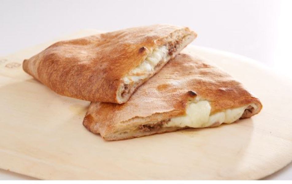 Order Steak & Cheese Calzone - Calzone food online from Sal Pizza store, Laconia on bringmethat.com