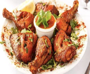 Order Tandoori Chicken food online from Oasis Multicuisine store, Baton Rouge on bringmethat.com