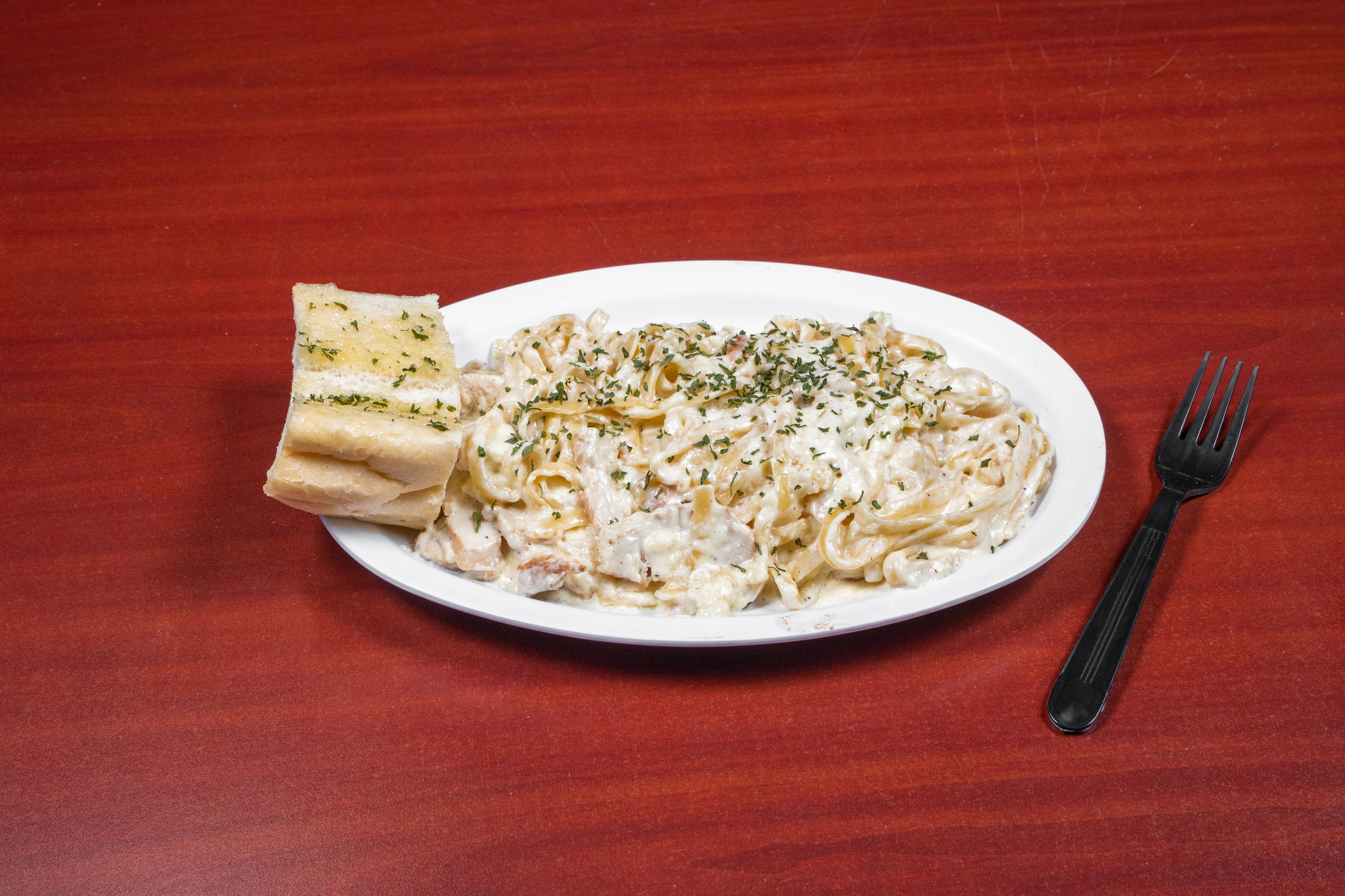 Order Chicken Fettuccine Alfredo - Entree food online from Brothers Pizza Express store, Magnolia on bringmethat.com