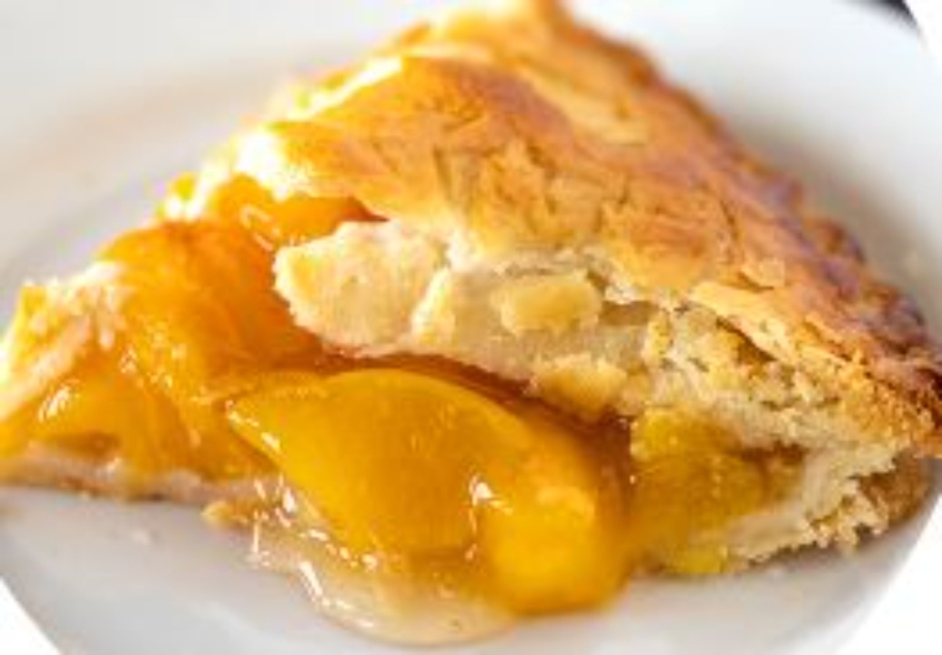 Order Peach Pie food online from Marie Callenders Restaurant & Bakery store, Riverside on bringmethat.com