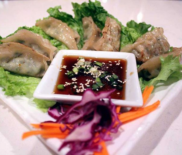 Order 5. Potstickers food online from Araya's Place store, Los Angeles on bringmethat.com