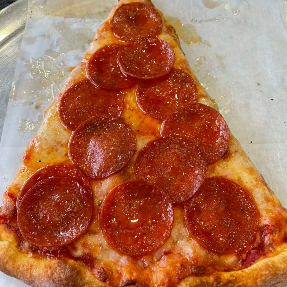 Order Pepperoni Pizza Slice - Slice food online from Michelangelo's Pizza store, East Brunswick on bringmethat.com