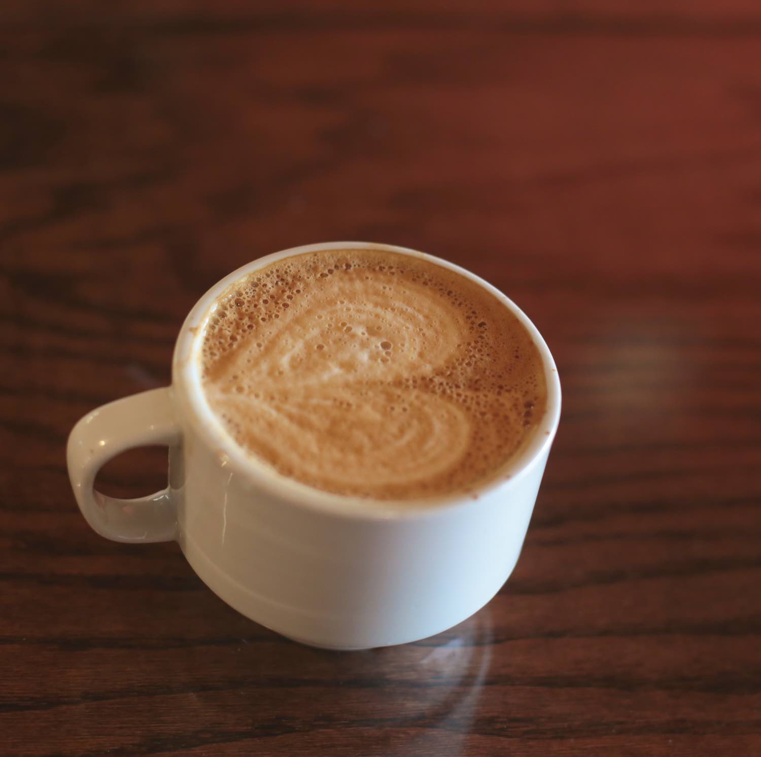 Order Latte food online from Howlin' Hounds Coffee store, Omaha on bringmethat.com