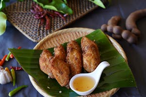 Order Chicken Wings food online from Tamarind Thai Cuisine store, Camarillo on bringmethat.com