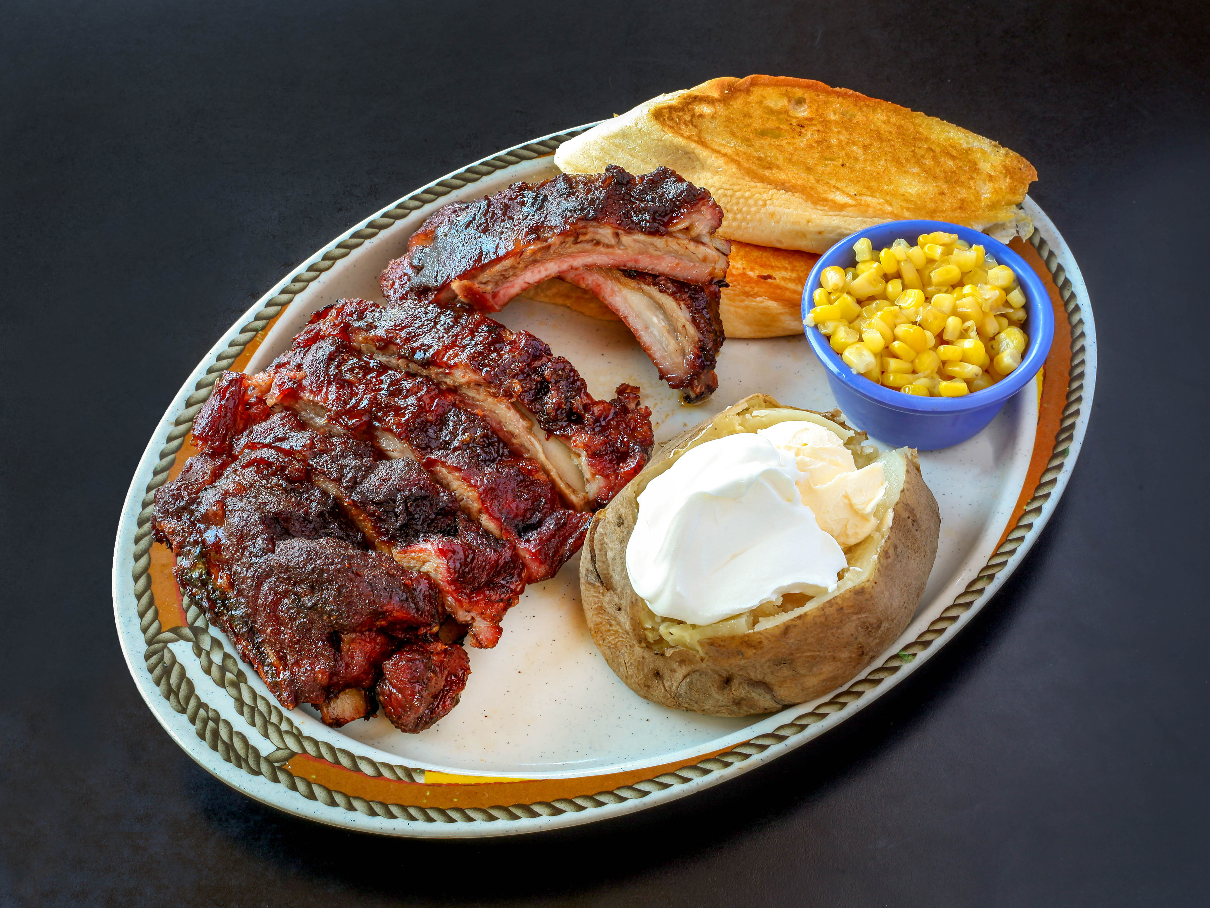 Order 1/2 Rack of Ribs Plate food online from Smoking Barrels BBQ store, St Louis on bringmethat.com