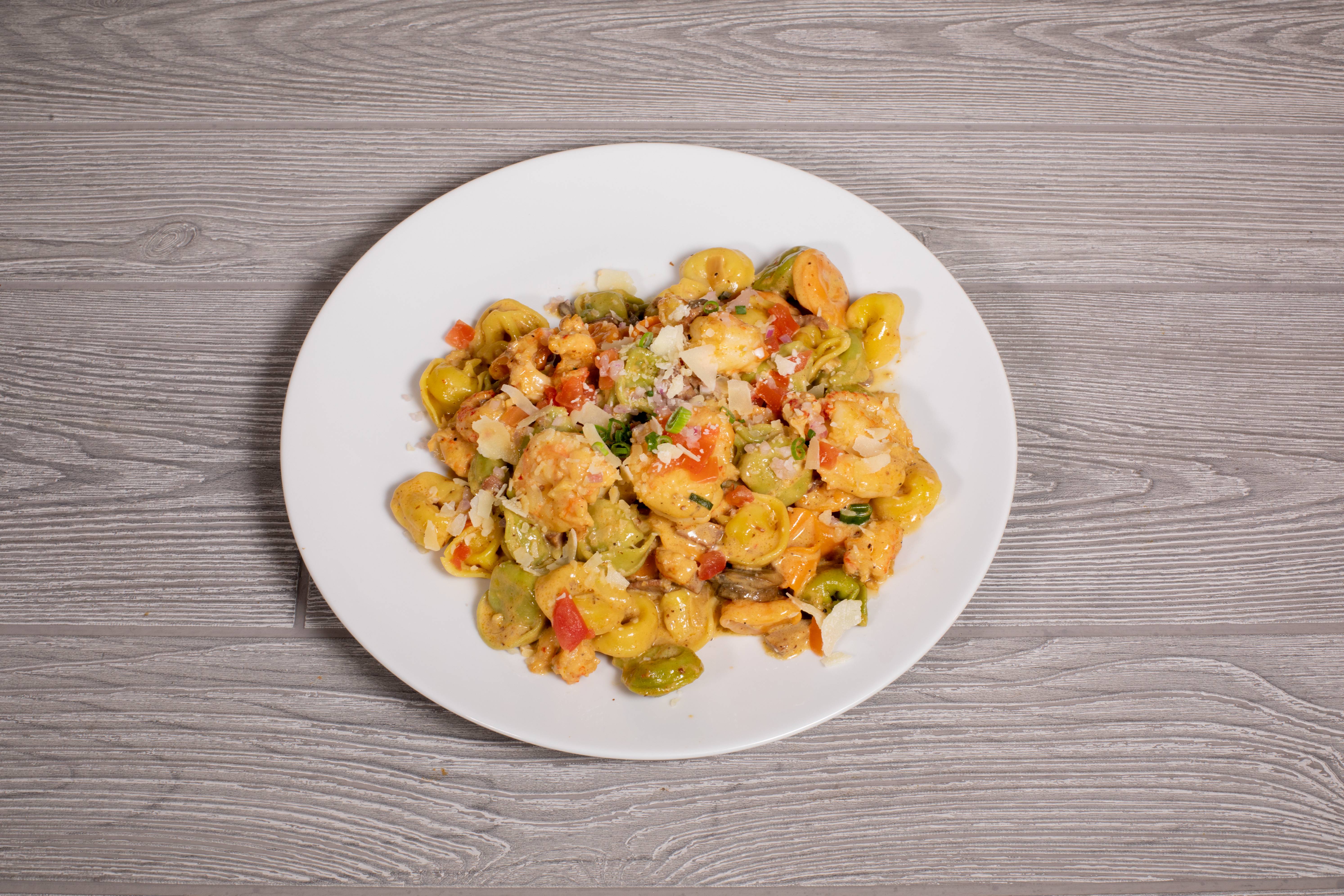 Order Shrimp and Crawfish Pasta food online from French Quarter Grille store, Austin on bringmethat.com