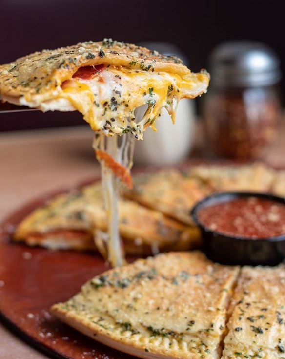 Order 4 Meat-4 Cheese Calzone food online from Mazzio Italian Eatery store, Norman on bringmethat.com