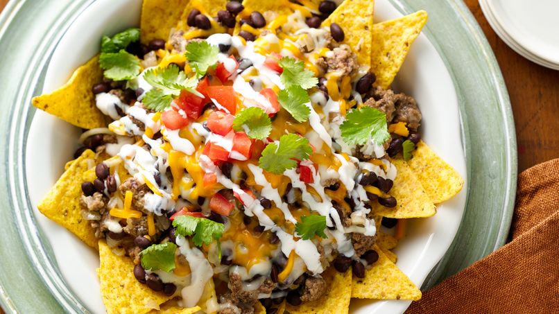 Order Nachos con Carne food online from Toreros Mexican Restaurant store, Cary on bringmethat.com