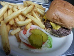 Order Cheeseburger food online from Neighborhood Cafe store, Kansas City on bringmethat.com
